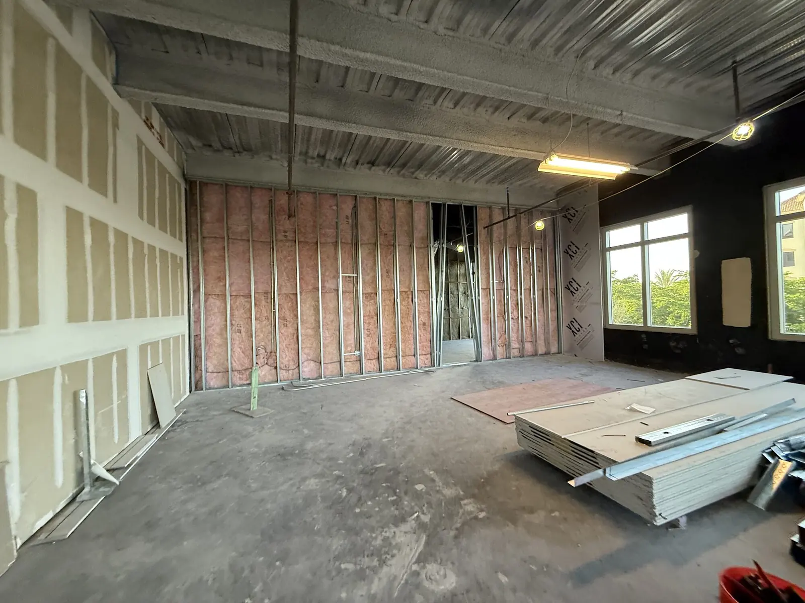 Board stocked and staged in the room it hangs in, insulation already inspected